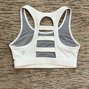 Born primitive white strappy back like new sports bra